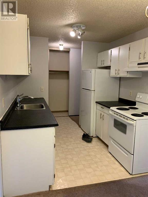 203, - 405 Columbia Boulevard W, Condo with 2 bedrooms, 1 bathrooms and null parking in Lethbridge AB | Image 5