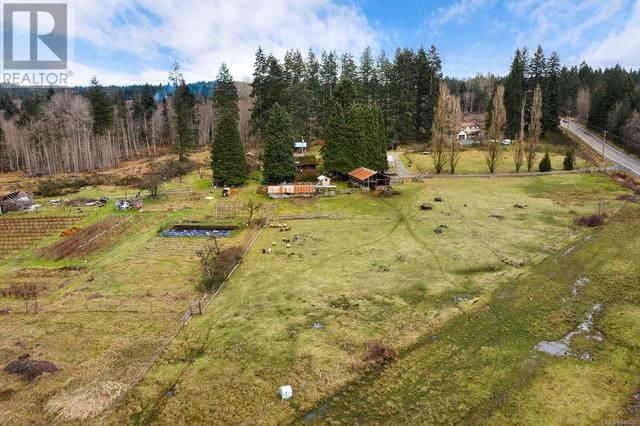 7522 Island Hwy N, House detached with 4 bedrooms, 3 bathrooms and 10 parking in Comox Valley C (Puntledge   Black Creek) BC | Image 4