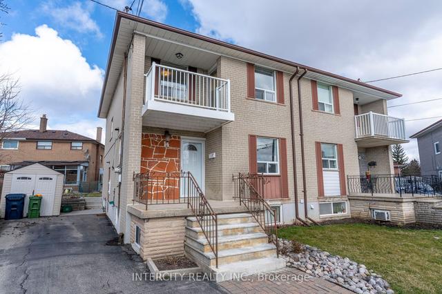 14 Ladyfield Crt, House semidetached with 4 bedrooms, 2 bathrooms and 4 parking in Toronto ON | Image 1