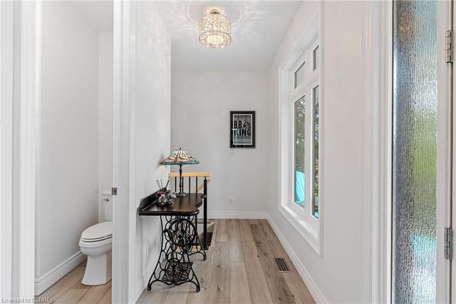 From the Foyer, access to the basement, and a 2 PC Powder Room. | Image 9