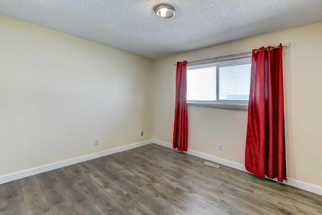 207 Penbrooke Close Se, House detached with 5 bedrooms, 2 bathrooms and 2 parking in Calgary AB | Image 9
