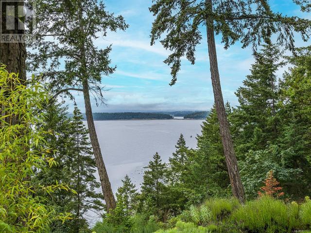 2565 Islands View Dr, House detached with 5 bedrooms, 3 bathrooms and 6 parking in Nanaimo B BC | Image 32
