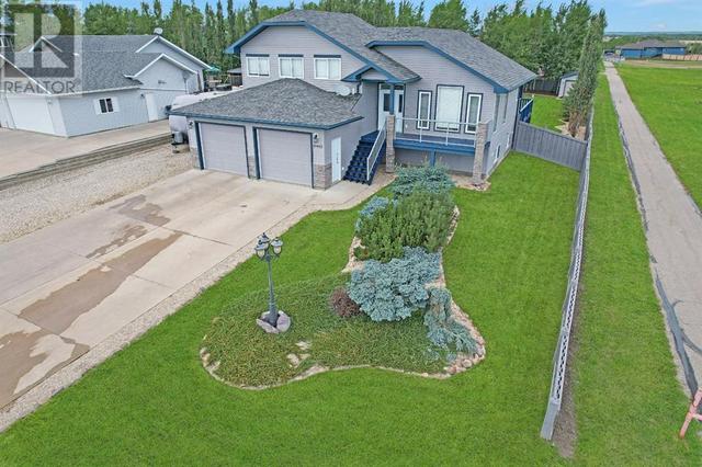 10412 101 Avenue, House detached with 4 bedrooms, 3 bathrooms and 10 parking in Sexsmith AB | Card Image