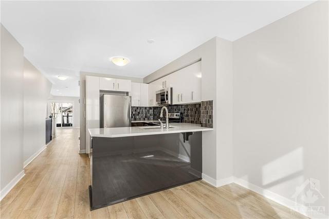 124 Bluestone Private, House attached with 2 bedrooms, 3 bathrooms and 1 parking in Ottawa ON | Image 6