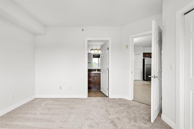 401 - 2419 Centre Street Nw, Condo with 2 bedrooms, 2 bathrooms and 1 parking in Calgary AB | Image 13