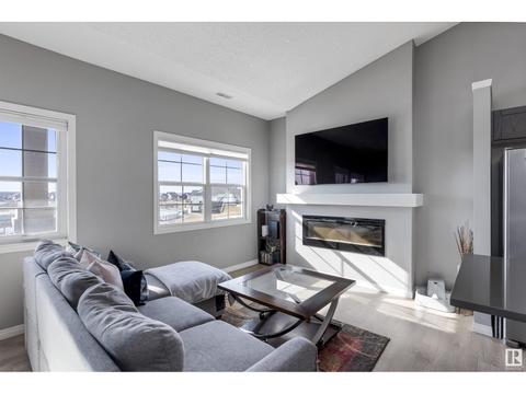 65 - 4029 Orchards Dr Sw, House attached with 2 bedrooms, 1 bathrooms and null parking in Edmonton AB | Card Image
