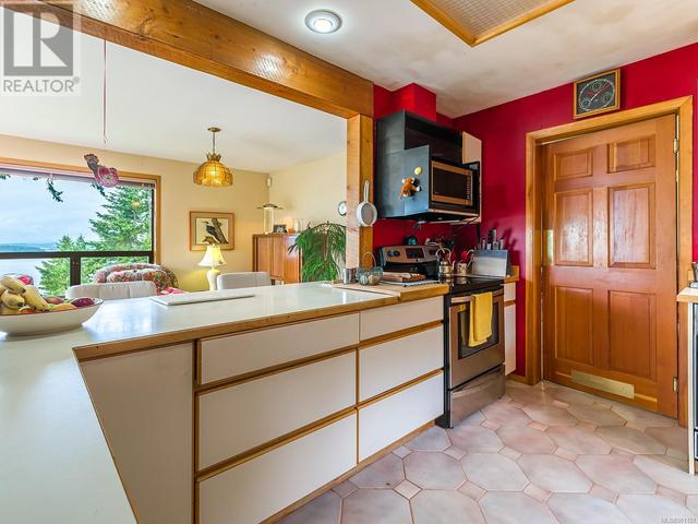 2565 Islands View Dr, House detached with 5 bedrooms, 3 bathrooms and 6 parking in Nanaimo B BC | Image 11