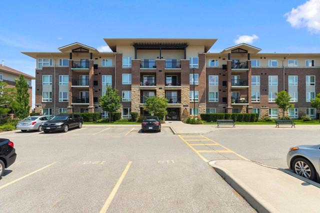 403 - 45 Kingsbury Sq, Condo with 2 bedrooms, 1 bathrooms and 1 parking in Guelph ON | Image 1