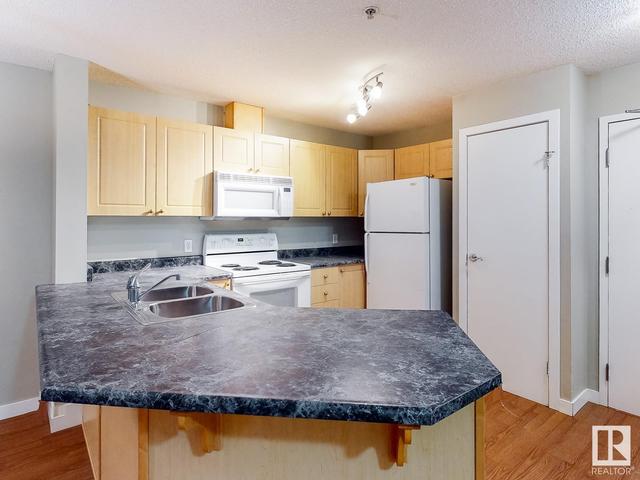 226 - 4312 139 Av Nw Nw, Condo with 2 bedrooms, 2 bathrooms and 1 parking in Edmonton AB | Image 12