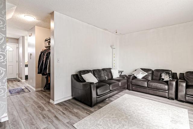 5 - 195 Manora Place Ne, Home with 3 bedrooms, 1 bathrooms and 2 parking in Calgary AB | Image 12