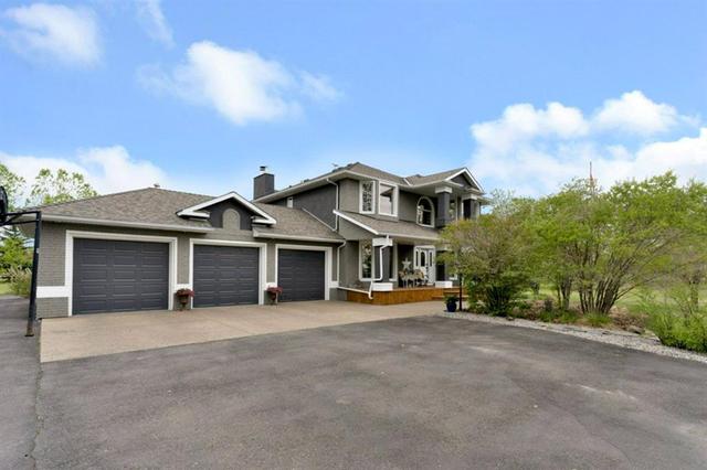 80021 210 Avenue W, House detached with 4 bedrooms, 3 bathrooms and 5 parking in Foothills County AB | Card Image