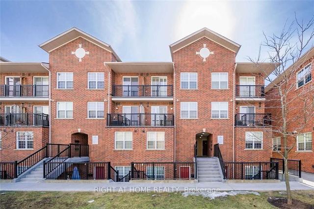 303 - 45 Strangford Lane, Townhouse with 2 bedrooms, 3 bathrooms and 1 parking in Toronto ON | Image 1