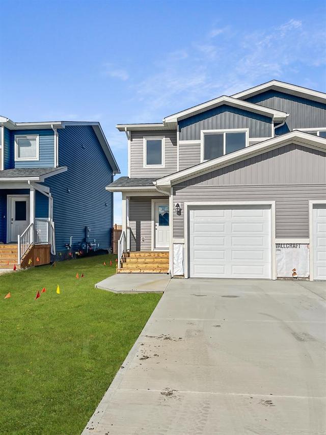 b - 9504 113 Avenue, Home with 3 bedrooms, 2 bathrooms and null parking in Greenview No. 16 AB | Image 13