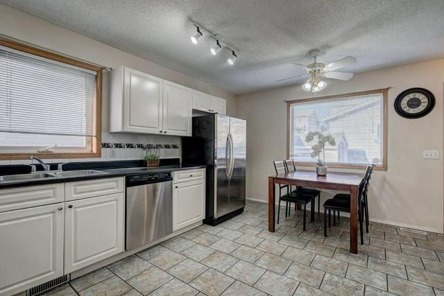 21 Millrise Mews Sw, House detached with 4 bedrooms, 1 bathrooms and 2 parking in Calgary AB | Image 8