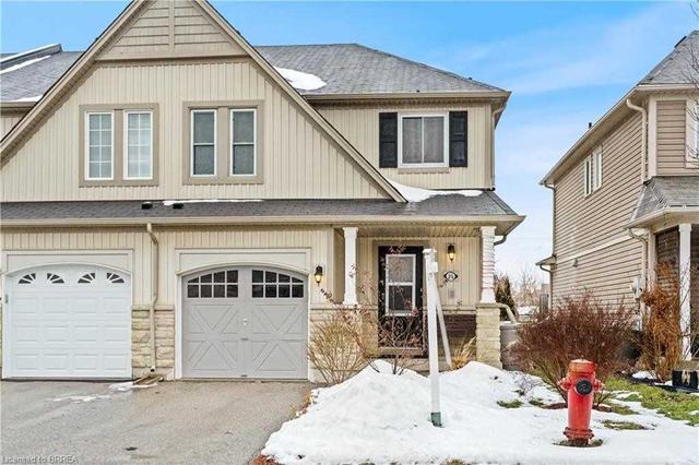220 Blackburn Dr, Townhouse with 2 bedrooms, 3 bathrooms and 2 parking in Brantford ON | Image 1