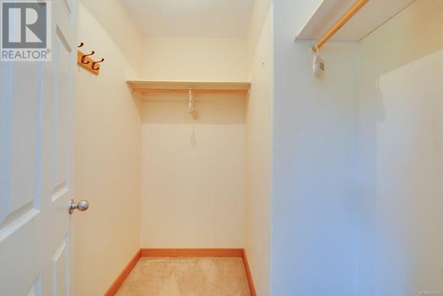 walk in closet in primary bedroom | Image 22