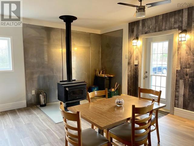 DINING TO WOOD STOVE | Image 7