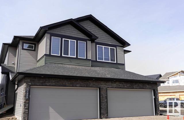 1457 Cherniak Wy Sw, House semidetached with 4 bedrooms, 2 bathrooms and null parking in Edmonton AB | Card Image