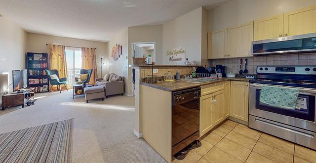 2412 - 1140 Taradale Drive Ne, Condo with 2 bedrooms, 2 bathrooms and 1 parking in Calgary AB | Image 12