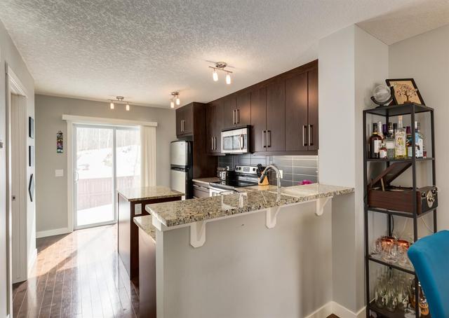 35 Aspen Hills Drive Sw, Home with 3 bedrooms, 3 bathrooms and 1 parking in Calgary AB | Image 13
