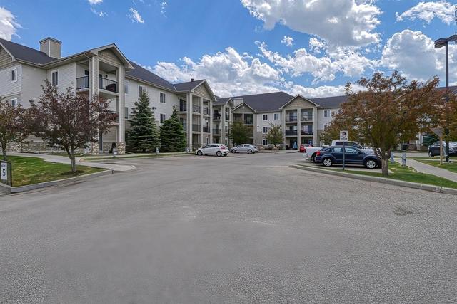 1235 - 2395 Eversyde Avenue Sw, Condo with 2 bedrooms, 2 bathrooms and 1 parking in Calgary AB | Image 1