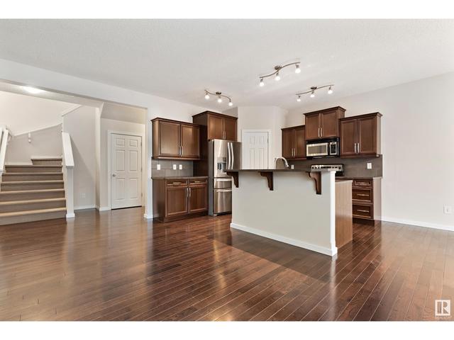 8715 10 Av Sw, House detached with 4 bedrooms, 3 bathrooms and 4 parking in Edmonton AB | Image 7