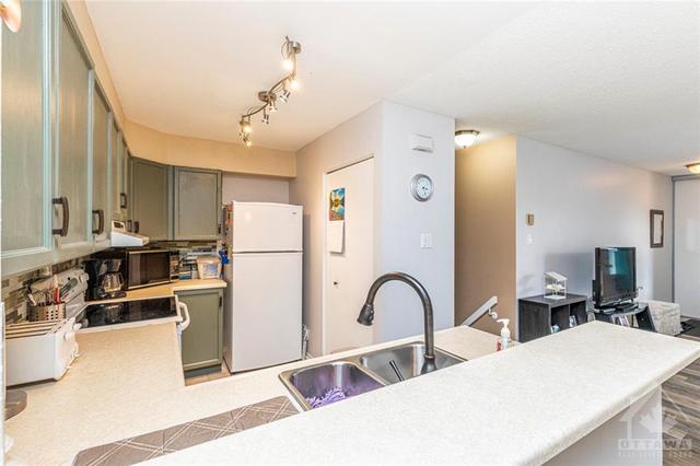 100 - 1725 Marsala Crescent, House attached with 2 bedrooms, 1 bathrooms and 2 parking in Ottawa ON | Image 12
