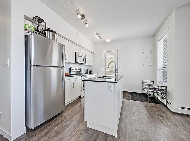 401 - 1740 9th Street Nw, Condo with 2 bedrooms, 1 bathrooms and 1 parking in Calgary AB | Image 7