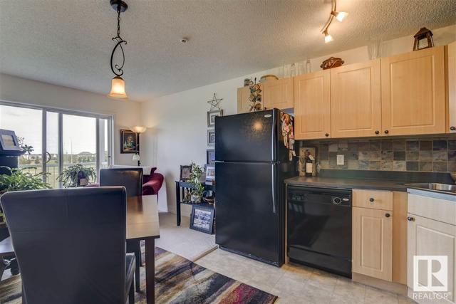 303 - 70 Woodsmere Cl, Condo with 1 bedrooms, 1 bathrooms and null parking in Fort Saskatchewan AB | Image 7