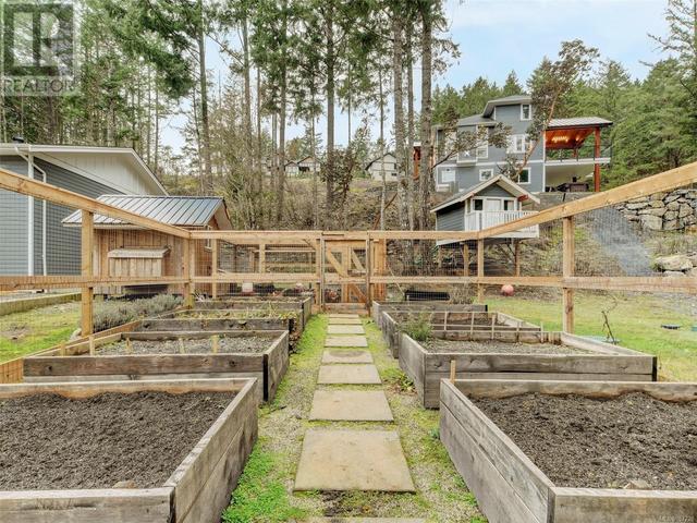10 Raised Garden Beds Surrounded by Deer fence. Playhouse and Chicken Coop | Image 63