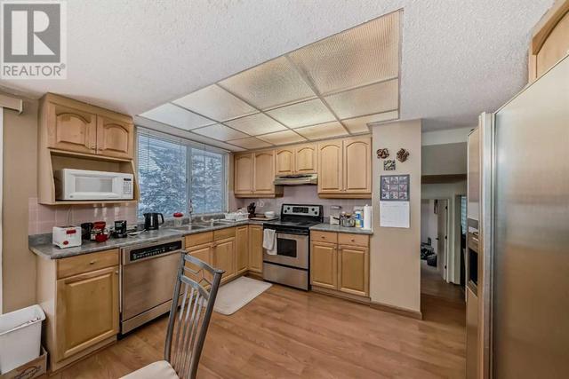 14 Varmoor Place Nw, House detached with 4 bedrooms, 2 bathrooms and 4 parking in Calgary AB | Image 6
