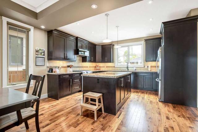 1129 Renfrew Drive Ne, Home with 4 bedrooms, 3 bathrooms and 2 parking in Calgary AB | Image 11