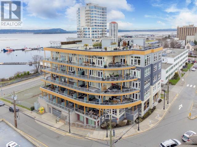 303 - 10 Chapel St, Condo with 1 bedrooms, 1 bathrooms and 1 parking in Nanaimo BC | Image 1