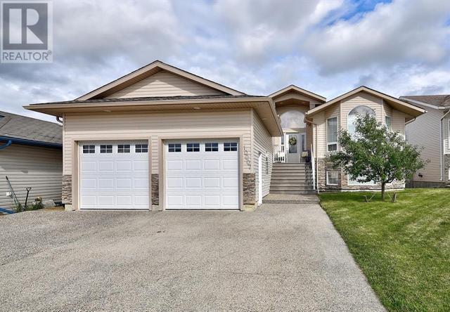 10007 104 Street, House detached with 5 bedrooms, 3 bathrooms and 5 parking in Sexsmith AB | Card Image