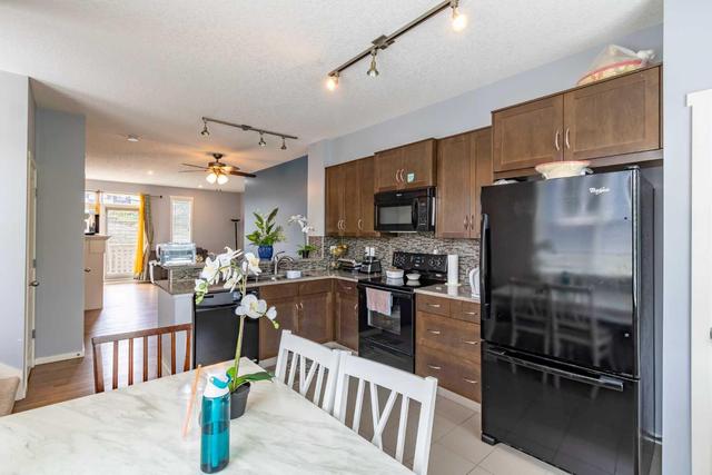 25 Kinlea Way Nw, Home with 3 bedrooms, 2 bathrooms and 3 parking in Calgary AB | Image 13