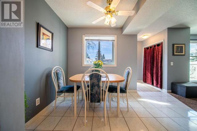 70, - 14736 Deerfield Drive Se, House attached with 2 bedrooms, 1 bathrooms and 2 parking in Calgary AB | Image 9