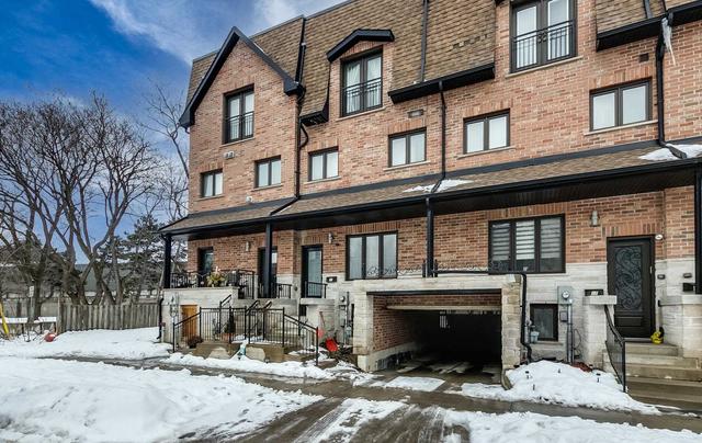 21 Stadacona Dr, House attached with 4 bedrooms, 4 bathrooms and 1 parking in Toronto ON | Image 1