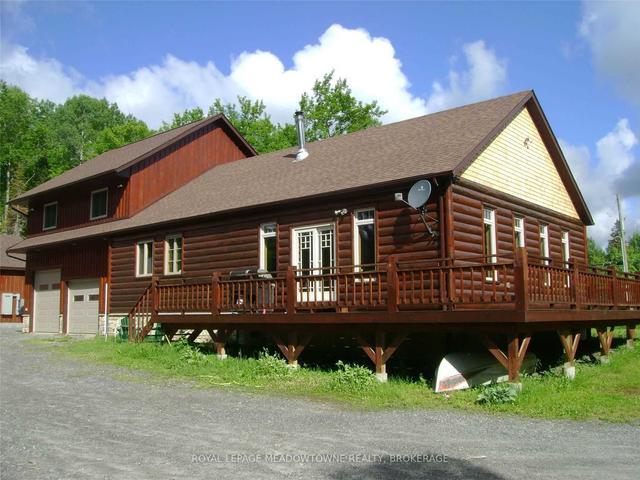 8721 Highway 522, House detached with 5 bedrooms, 2 bathrooms and 22 parking in Parry Sound, Unorganized, Centre Part ON | Image 1