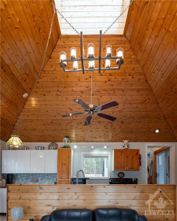 Vaulted Pine Ceiling with skylight for lots of natural light | Image 9