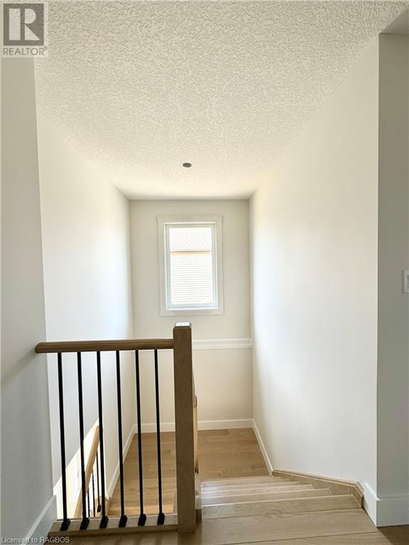 Hardwood staircase from the 2nd floor to the main floor | Image 25