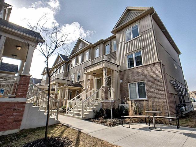 101 - 2500 Hill Rise Crt, Townhouse with 2 bedrooms, 2 bathrooms and 2 parking in Oshawa ON | Image 1