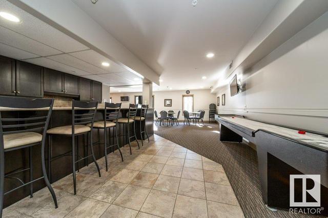 335 - 1406 Hodgson Wy Nw, Condo with 2 bedrooms, 2 bathrooms and 2 parking in Edmonton AB | Image 23