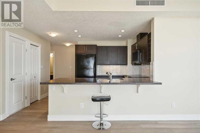 703, - 55 Spruce Place Sw, Condo with 2 bedrooms, 2 bathrooms and 1 parking in Calgary AB | Image 6