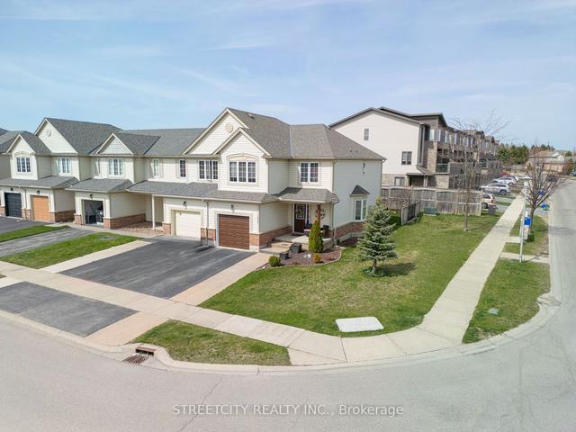 1434 Evans Blvd N, House attached with 4 bedrooms, 3 bathrooms and 3 parking in London ON | Image 1