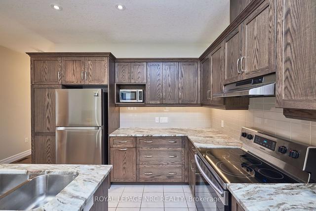 115 Borden Tr, Townhouse with 2 bedrooms, 2 bathrooms and 4 parking in Welland ON | Image 35