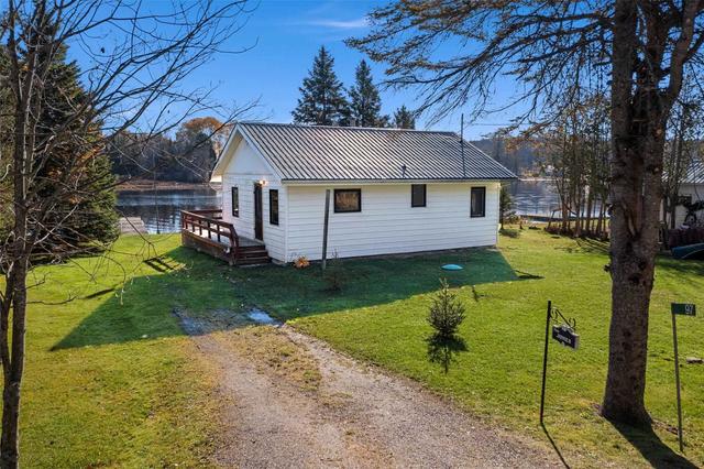 97 Golf Course Rd, House detached with 2 bedrooms, 1 bathrooms and 4 parking in Magnetawan ON | Image 19