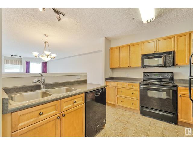 303 - 102a Bridgeport Cx, Condo with 1 bedrooms, 1 bathrooms and null parking in Leduc AB | Image 6