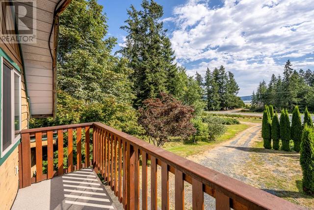 8185 Island Hwy S, House detached with 4 bedrooms, 4 bathrooms and 6 parking in Comox Valley A BC | Image 50