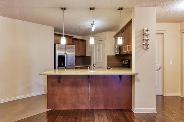 2212 - 175 Panatella Hill Nw, Condo with 2 bedrooms, 2 bathrooms and 1 parking in Calgary AB | Image 4