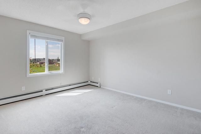 7204 - 304 Mackenzie Way Sw, Condo with 2 bedrooms, 1 bathrooms and 1 parking in Calgary AB | Image 21
